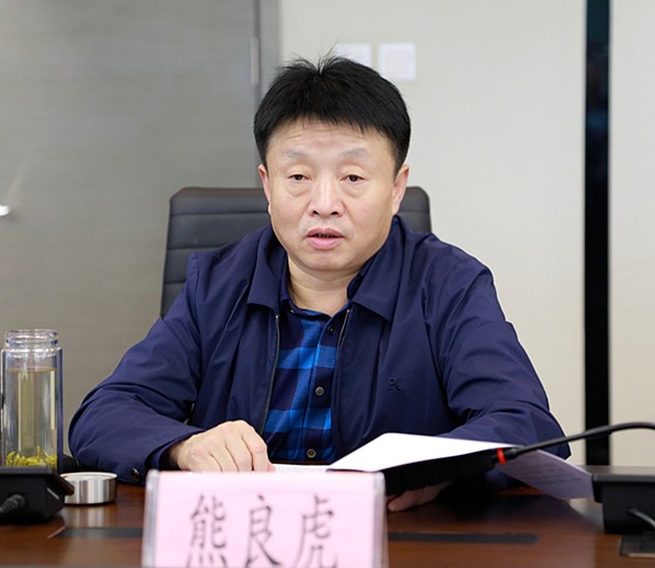 熊良虎会见宜君县县长曹全虎