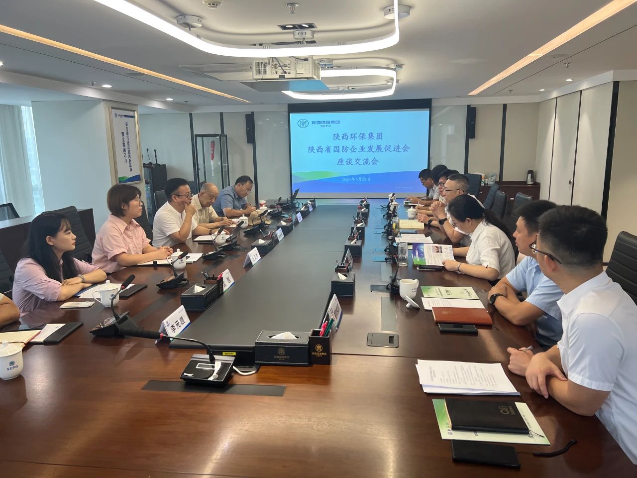 陕西6008集团集团与陕西省国防企业生长增进会座谈交流